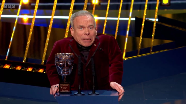 Warwick Davis ai BAFTA 2025 (©BAFTA 2025 - The Independent)